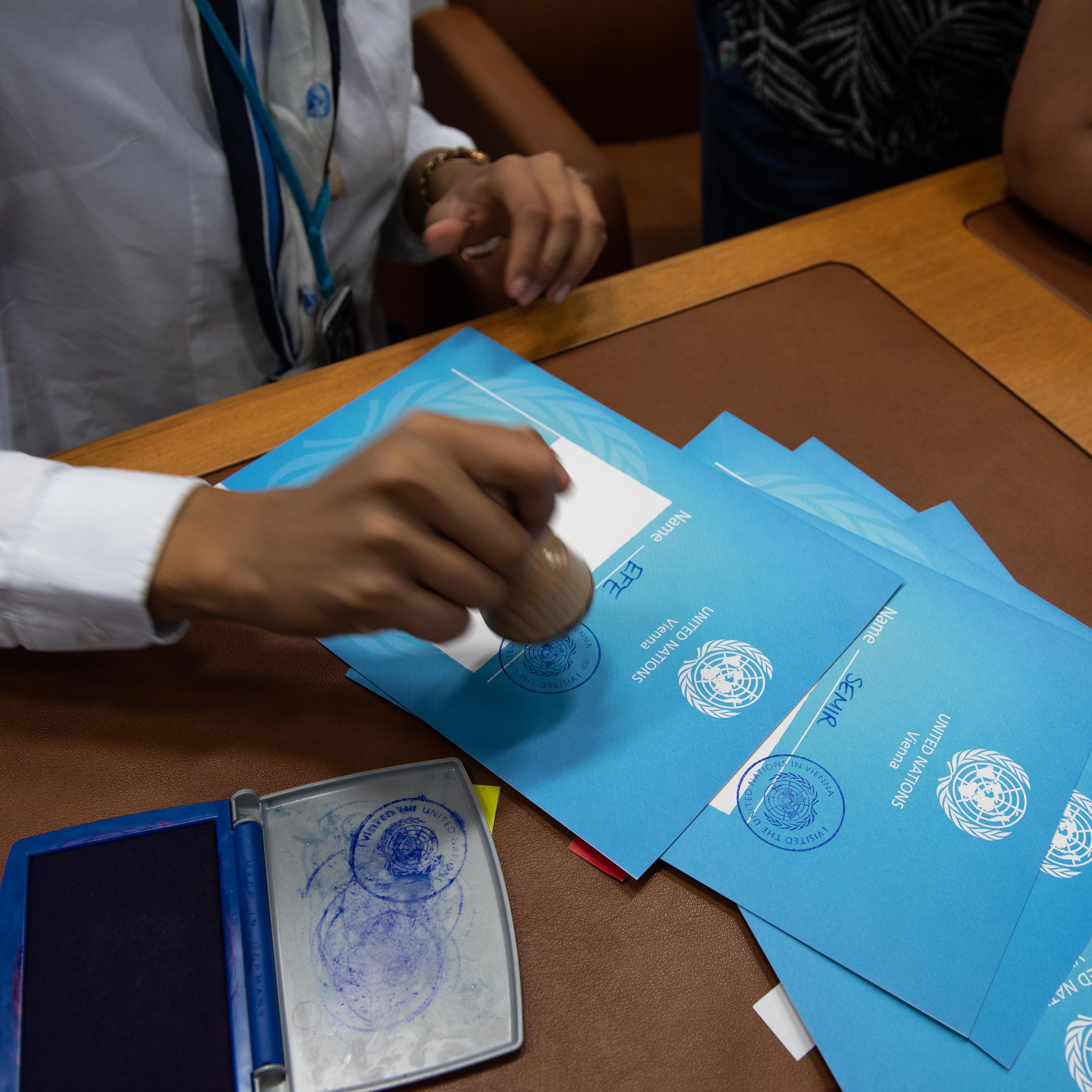 Close up of tour handout being stamped